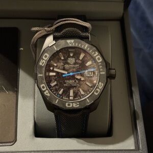 Black carbon and blue tag Heuer